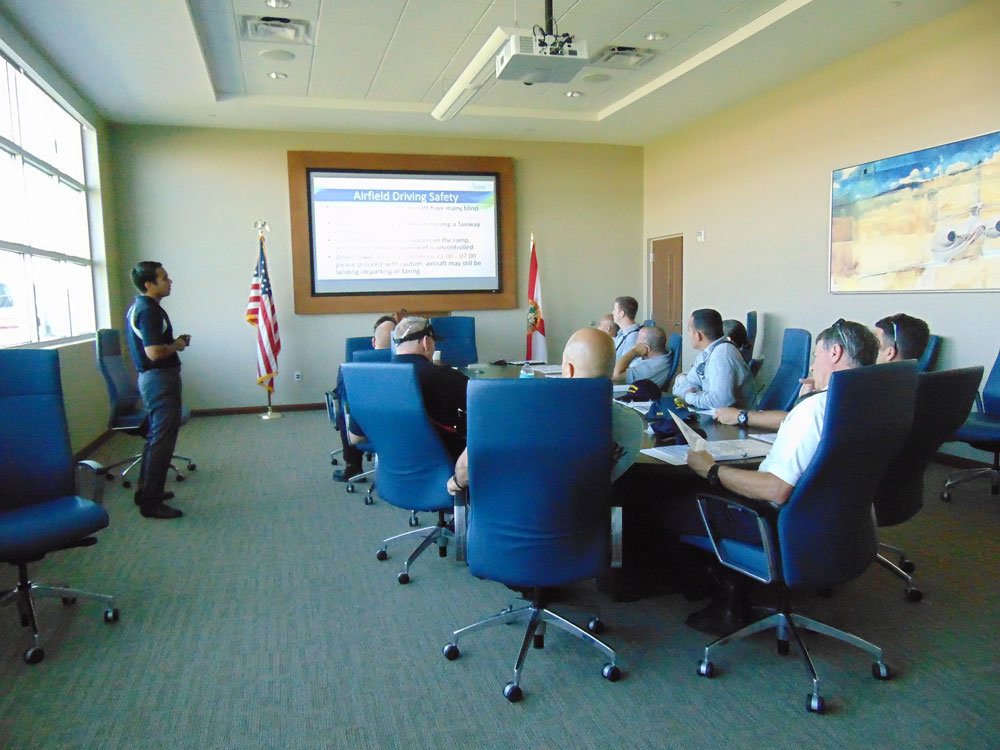 Boca Raton Fire Rescue personnel attend a classroom session about airfield safety rules and regulations at the Boca Raton Airport.