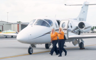 Female pilot crew leave private jet