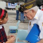Veteran talks with students at the Wings of Freedom Tour
