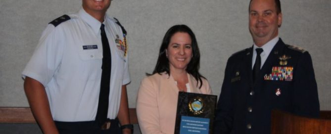 CAP Award with BRAA Airport Executive Director Clara Bennett accepts award from Civil Air Patrol