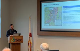 Pictured is Robert Abbott speaking about the Noise Abatement Program.